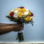bouquet-of-roses-on-yellow-red-and-white-